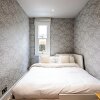Отель Fulham Serenity: Your Charming 2-bed Retreat в Лондоне