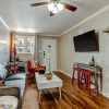 Отель Vibrant, Colorful Condo Building With Backyard Firepit and Games, фото 14