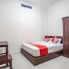 Отель OYO 93477 Almahyra Guest House Syariah, фото 9