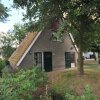 Отель Detached Holiday Home With Steam Shower Near Vrachelse Heide, фото 18