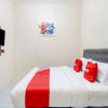 Отель OYO 90175 Tl Guest House, фото 4