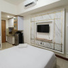 Отель White And Cozy Studio At Vida View Makassar Apartment, фото 3