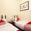 Отель OYO 719 Penginapan Panatapan Almonsari Resort, фото 10