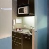 Отель Ayres Plaza Apartments, фото 4