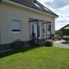 Отель Nice Holiday Home in Orsfeld Eifel With Garden, фото 22