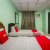 Отель OYO 90124 Payang Puri Baru Hotel, фото 16