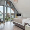 Отель Ostsee - Reetdachhaus Nr 7 
