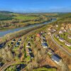 Отель Single storey bungalow near water reservoir in the Nordeifel, фото 10