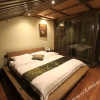 Отель Xifeng Shouma Hostel Huilongge, фото 2