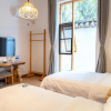 Отель Kunming Airport Chun Zhuang Homestay, фото 6