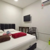 Отель OYO HOME 90261 Hom2rex Kuching Homestay, фото 16