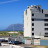 Отель Sunrise Penthouse Muizenberg Beach, фото 1
