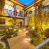 Отель Lijiang Phoenix Health Resort Hotel (Shuhe Ancient Town Branch), фото 1