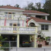 Отель Palm Paradise Guest House and Apartments в Пэйнс-Бэй
