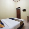 Отель Tiga Mas Inn by OYO Rooms, фото 22