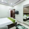 Отель Treebo Greenwood Premier Suites, Old Airport Road, фото 7