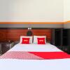 Отель Wisma Etiga by OYO Rooms, фото 1