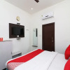 Отель OYO 23414 Jauhari Guest House, фото 5