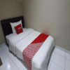 Отель Super OYO 93358 Sukamulya Homestay, фото 4