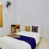 Отель SPOT ON 93988 Guest House Wijaya Syariah, фото 7