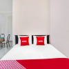 Отель OYO 91827 Tutus Homestay Syariah, фото 7
