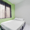 Отель SPOT ON 91792 Solo Baru 2 Homestay Syariah, фото 13