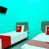 Отель OYO 91731 Home Stay Elis Cateliya Syariah, фото 6