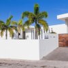 Отель Villa White Sand - Charming villa with breathtaking view over the Spanish Water and indoor Game Room, фото 2
