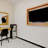 Отель OYO Capital O 90410 Griya Amanah Jajar Syariah, фото 7