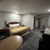 Отель Mid Towne Inn and Suites, фото 2