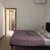 Отель Riva Reno 4 Rooms в Болонье