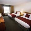 Отель Service Plus Inns & Suites Drayton Valley, фото 2