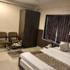 Отель JK Rooms 121 Hotel Shaheen International, фото 12