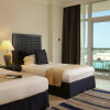 Отель Beach Rotana All Suites, фото 2