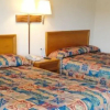 Отель Travelers Inn & Suites, фото 34