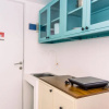 Отель Cozy And Warm Studio At Urbantown Serpong Apartment, фото 10