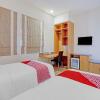 Отель OYO 3905 Graha 100 Guest House Syariah, фото 5