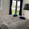 Отель Brand New Beachfront Ground Floor With Garden 2 Bed Apartment 6 Guests, фото 15