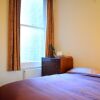 Отель Kensington 2 Bedroom Flat With Balcony в Лондоне