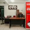 Отель OYO 1102 Griya Aisyah Syariah 1, фото 2