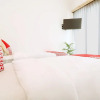 Отель OYO 2896 Uma Menuh Guest House Near Pantai Keramas, фото 12