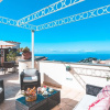 Отель Villa Relax With External Hydro-massage Tub Sea View and Private Terraces, фото 1
