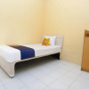 Отель SPOT ON 2830 Azka Guest House Syariah, фото 15