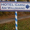 Отель Am Waldhang Garni в Гилхинге