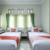Отель Wisma Teratai by OYO Rooms, фото 13
