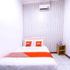 Отель OYO 1421 Kasmaran Guest House Syariah, фото 13