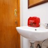 Отель Santo Guest House by RedDoorz, фото 10