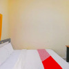 Отель OYO 91445 Sandat Guest House, фото 4