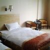 Отель Liang Guang Business Hotel- Guilin, фото 6
