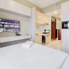 Отель Relaxing And Homey Studio Room Sky House Bsd Apartment, фото 6